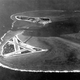 The Midway Atoll, looking westward. Eastern Island, with the airfield, is in the foreground, with Sand Island behind. (US Navy)